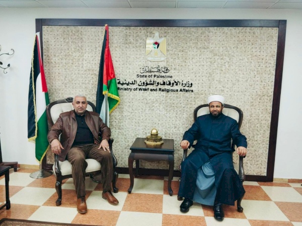 لقاء سماحة الشيخ الأستاذ الدكتور محمد مصطفى نجم وزير الأوقاف والشؤون الدينية بعميد الكلية الأستاذ الدكتور خالد مصطفى السراحنة